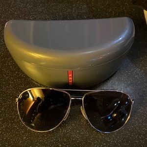 Prada Men’s sunglasses, very very mint with original case.